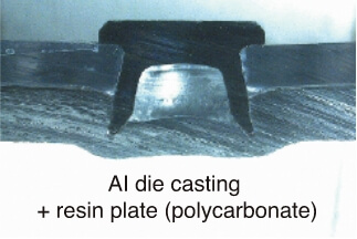 AI die casting + resin plate (polycarbonate)